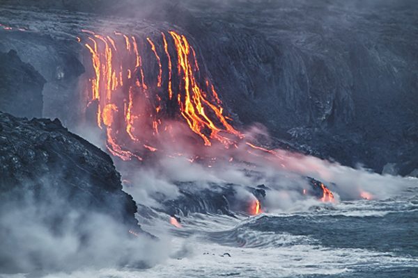 13709660 - lava erupting into pacific ocean in hawaii big island